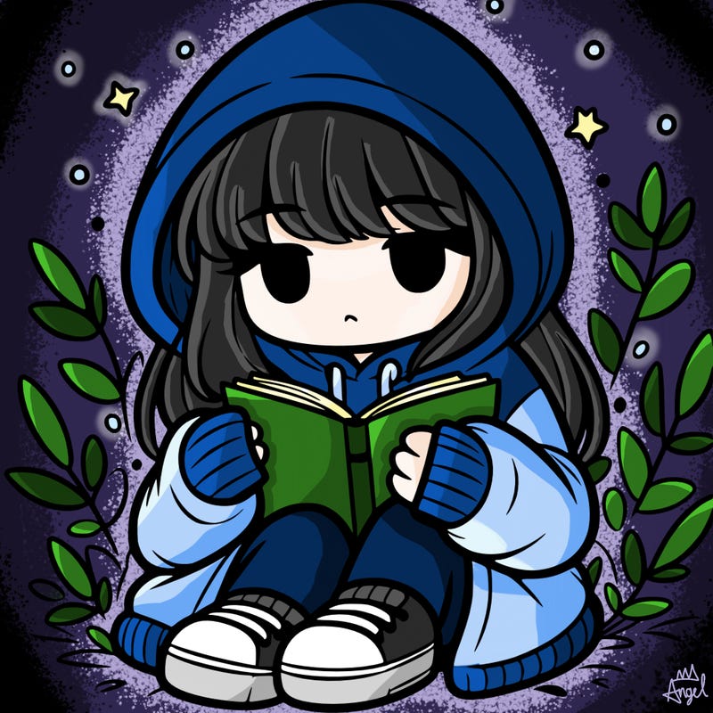 girl in oversized hoodie reading a book