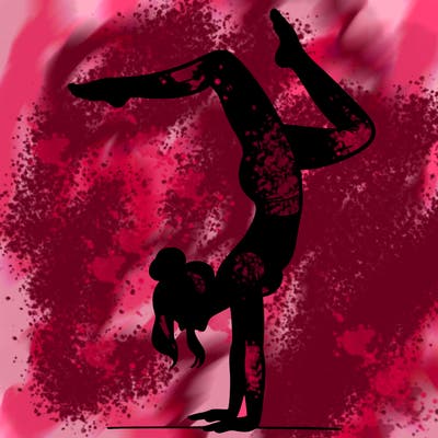 a woman doing a handstand