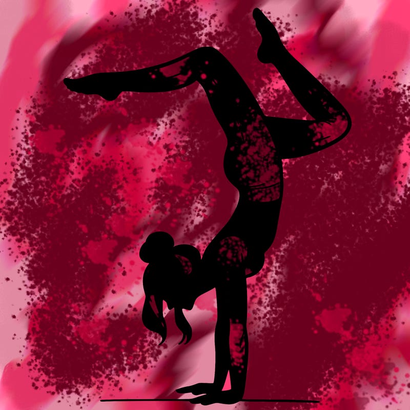 a woman doing a handstand