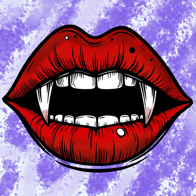 lips with vampire teeth