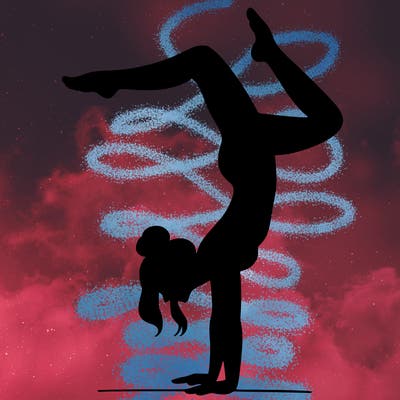 a woman doing a handstand