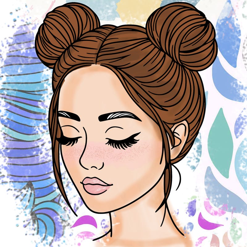 woman with hair buns