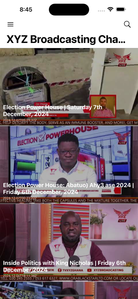 Power 97.9 FM - Captura de pantalla de la aplicación Power 97.9 FM mostrando un feed de noticias con videos sobre política ghanesa y las elecciones de 2024.