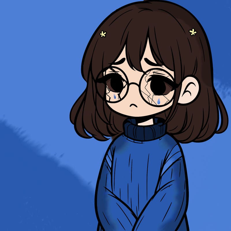 sad girl with glasses in a sweater