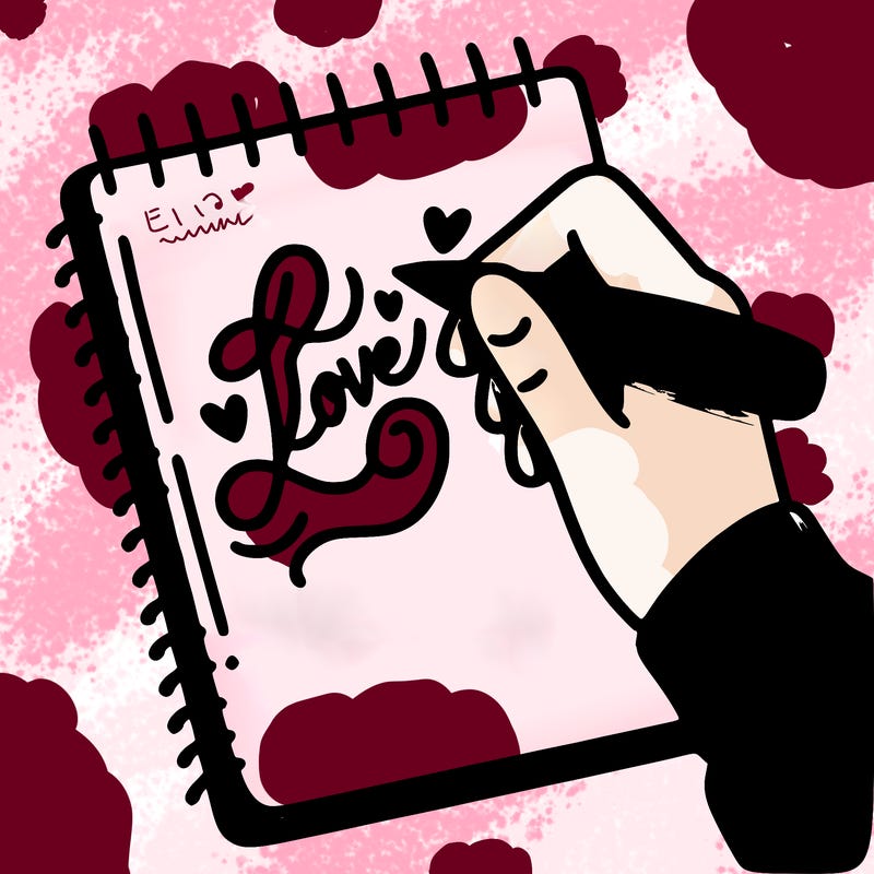 a hand writing “love” in calligraphy on a notebook