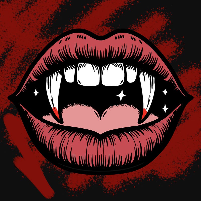 lips with vampire teeth