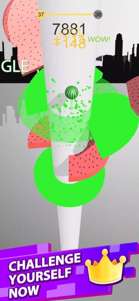 Captura de pantalla del juego Helix Jump mostrando una bola de sandía descendiendo a través de plataformas coloridas