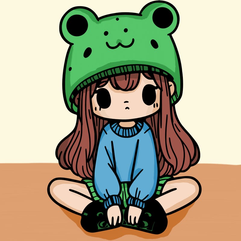 a girl wearing a frog hat and some frog socks