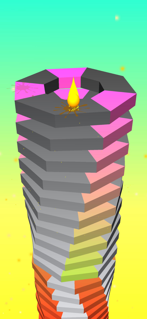 A yellow ball bouncing on a stack of colorful rotating blocks in the Crush Ball game