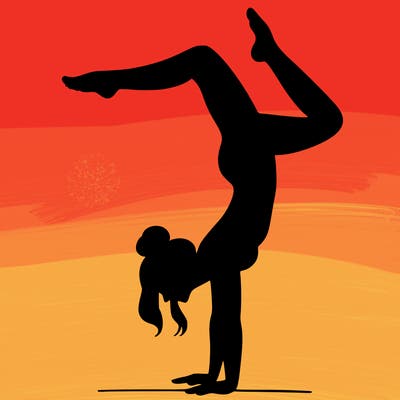 a woman doing a handstand