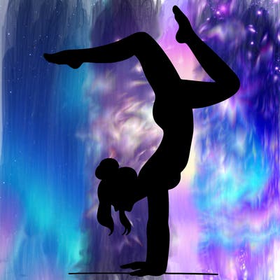 a woman doing a handstand