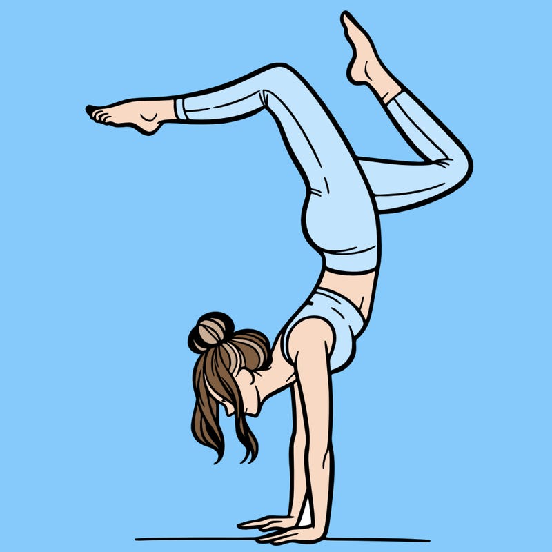 a woman doing a handstand