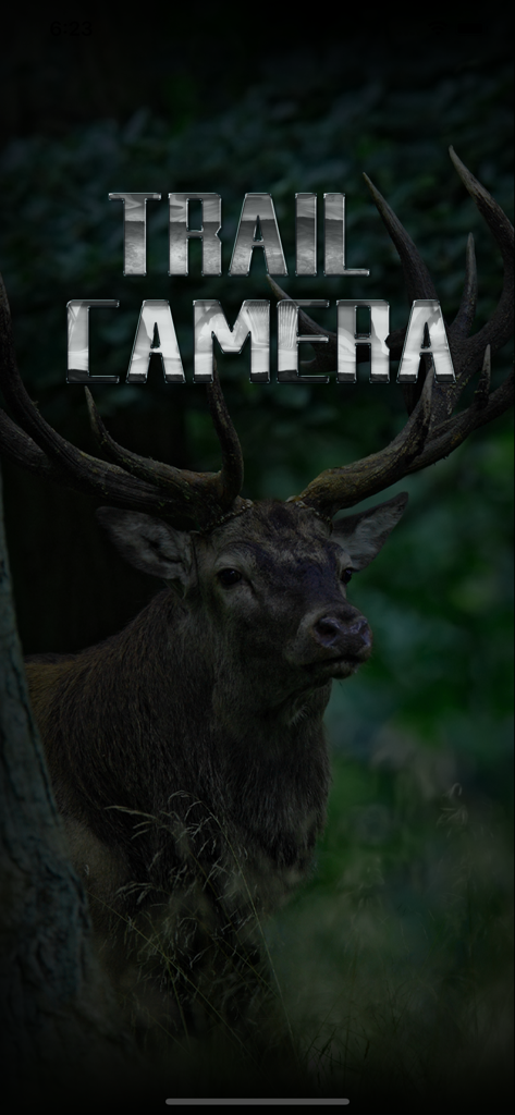 Ucon - Large buck with antlers in a dark forest setting on the Ucon trail camera app splash screen