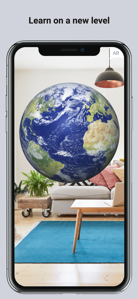 Augmented reality globe of Earth floating in a living room on a smartphone screen