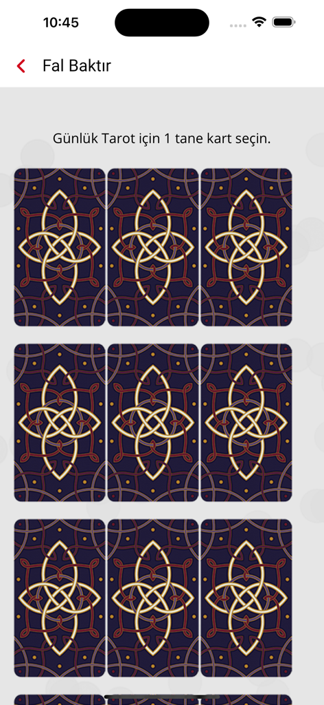 Daily tarot card selection screen with a grid of face-down cards in the Tarot Falı app.