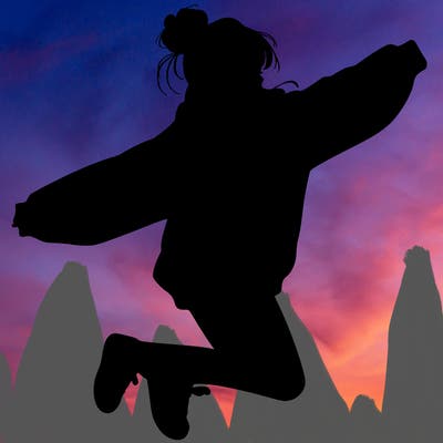 realistic girl jumping with a bun and oversized sweatshirt