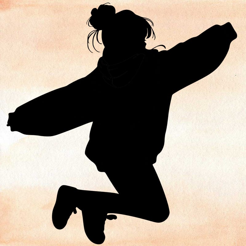 realistic girl jumping with a bun and oversized sweatshirt