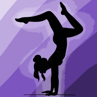 a woman doing a handstand