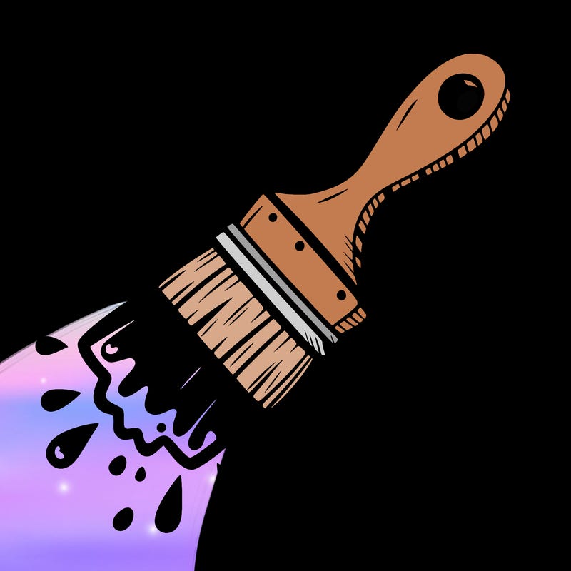 paint brush with splattered paint on it