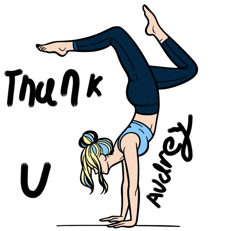 a woman doing a handstand