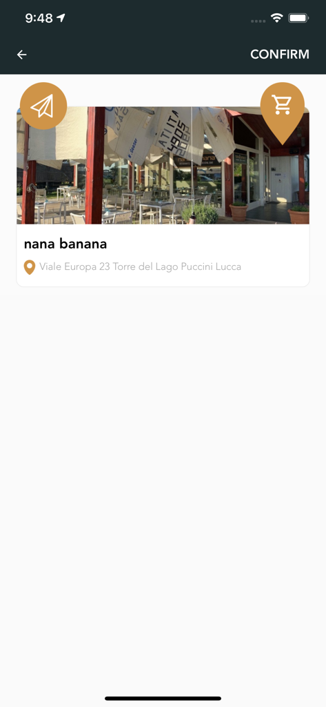 nana banana - Pantalla de la app Nana Banana que muestra la imagen del local del restaurante y la dirección para confirmar el pedido.