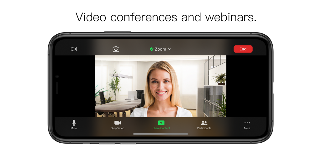 モバイルデバイスでZoomビデオ会議中にプロフェッショナルなオフィスバーチャル背景を使用する女性