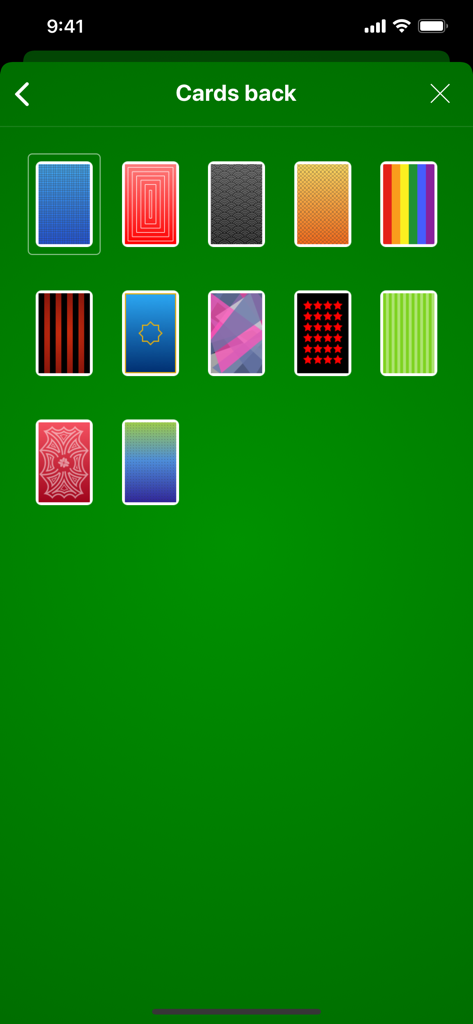 Solitaire The Game - Menu screen of Solitaire The Game showing multiple customizable card back design options on a green background