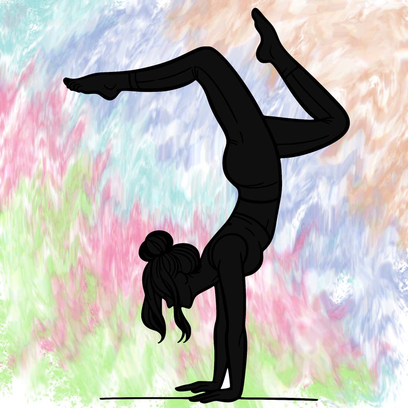 a woman doing a handstand