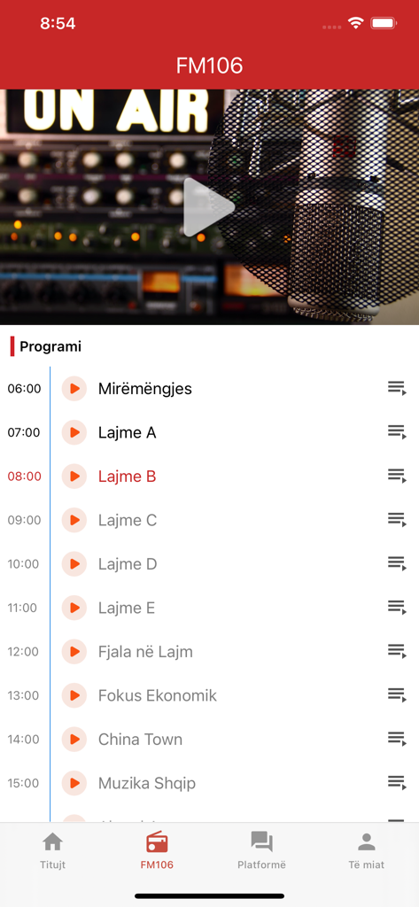 Ejani - Screenshot of the Ejani app showing the FM106 radio program schedule with Albanian news and music listings