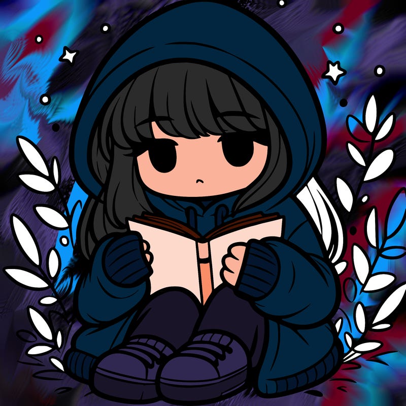 girl in oversized hoodie reading a book