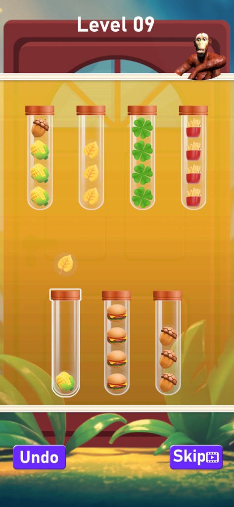 Gorilla Mukbang! ASMR Eating - A mobile game screen showing food items like burgers fries and vegetables being sorted into test tubes for a gorilla character