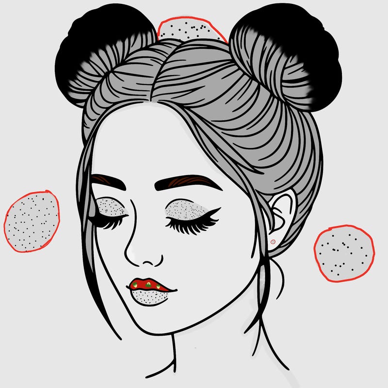 woman with hair buns