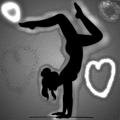 a woman doing a handstand