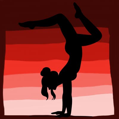 a woman doing a handstand