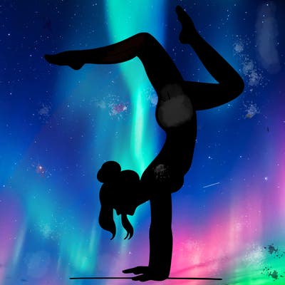 a woman doing a handstand