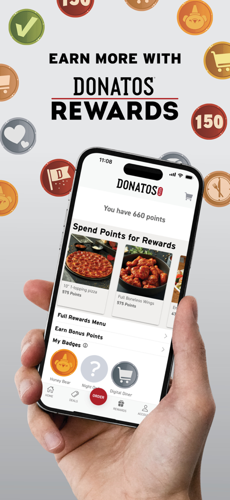 A hand holding a smartphone displaying the Donatos Pizza rewards interface showing points and menu items available for redemption.