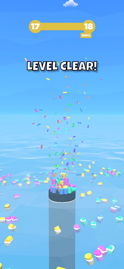 Tower Color - Hit and crash! - Level clear screen in Tower Color mobile game with colorful blocks and falling confetti