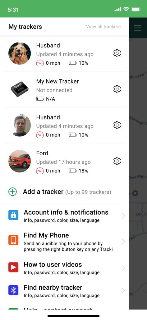 Interface of the Tracki GPS app showing a list of tracked devices for family pets and vehicles