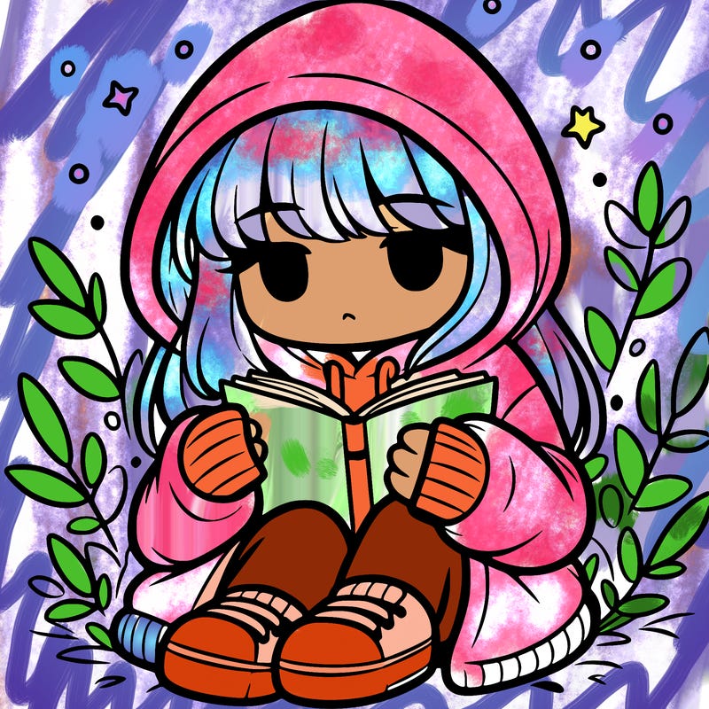 girl in oversized hoodie reading a book