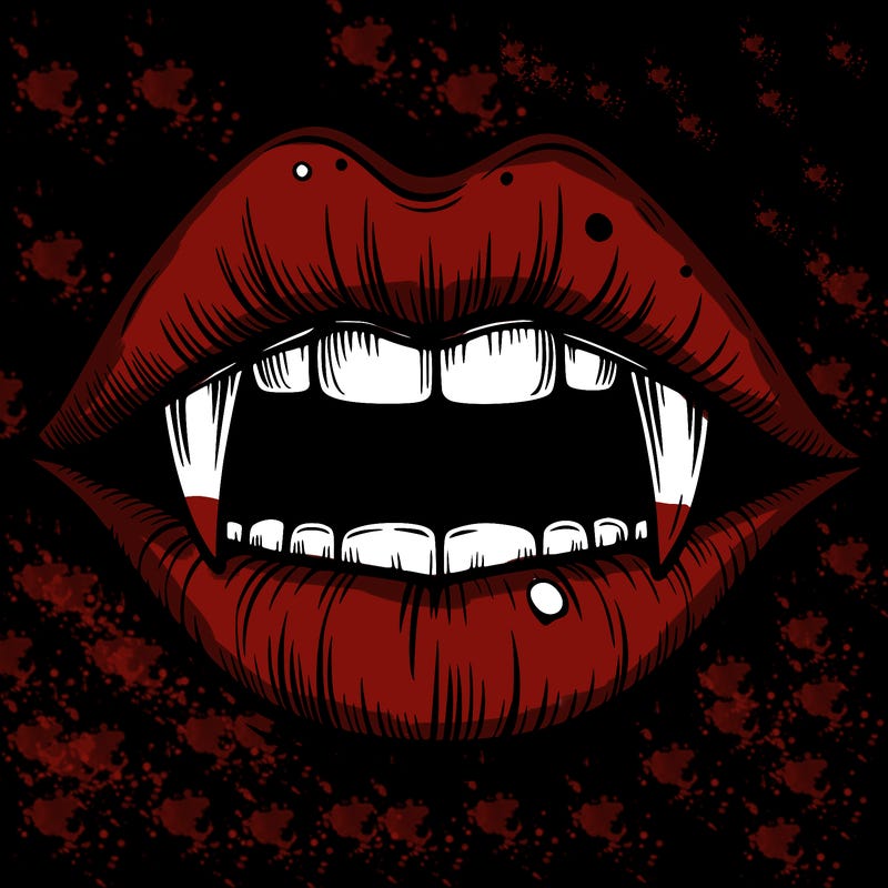 lips with vampire teeth