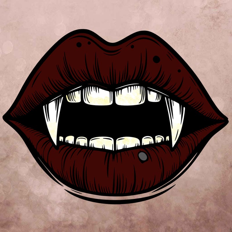 lips with vampire teeth