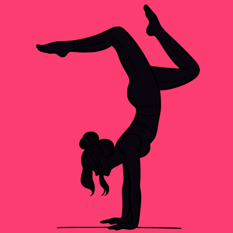 a woman doing a handstand