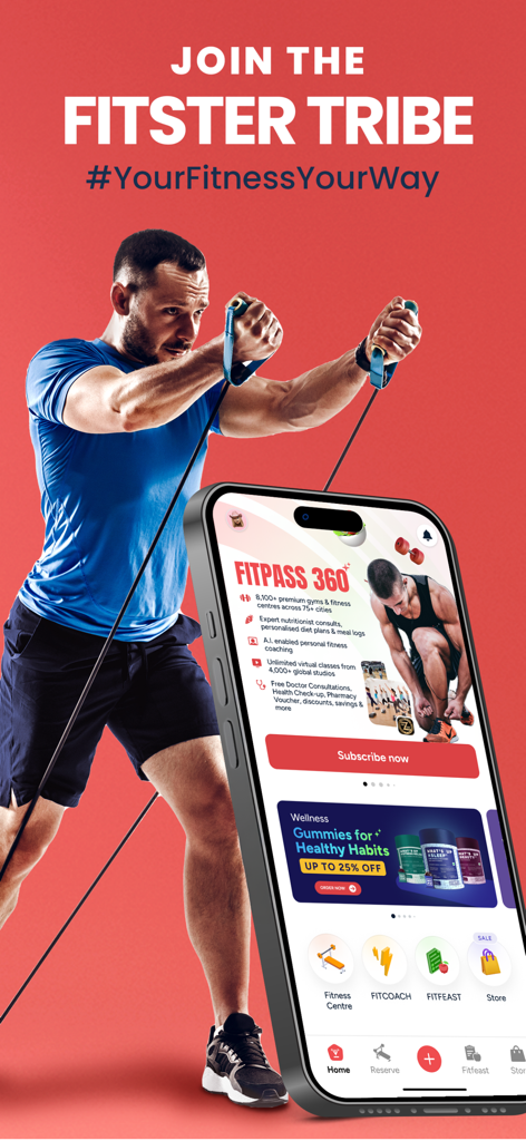 FITPASS - Fitness & Wellness - FITPASS 앱이 표시된 스마트폰 옆에서 저항 밴드로 운동하는 남성.