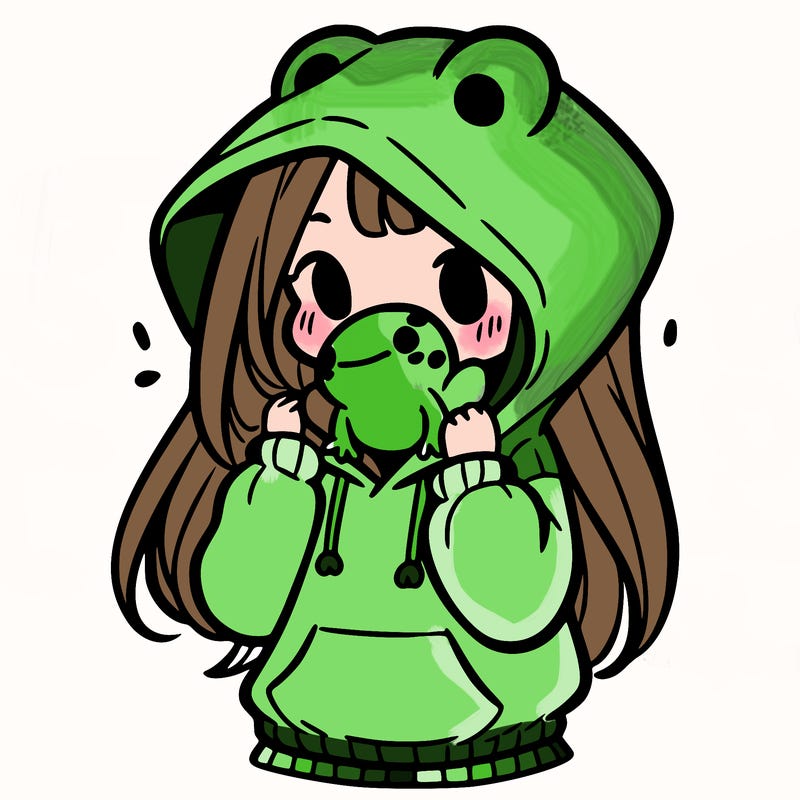 a girl holding a froggy hoodie