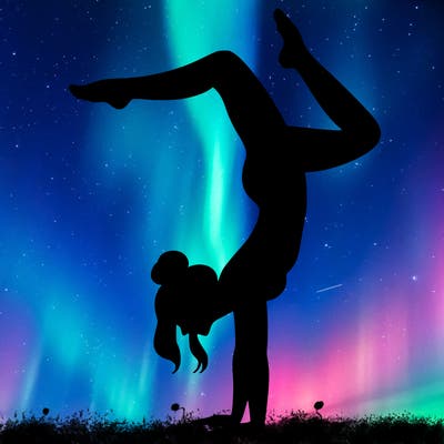 a woman doing a handstand