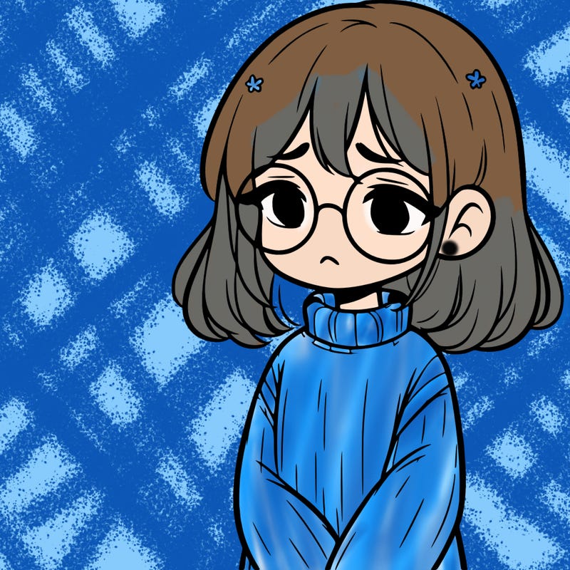 sad girl with glasses in a sweater