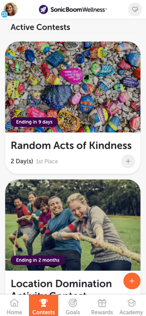Sonic Boom Wellness - Sonic Boom Wellness app active contests screen showing random acts of kindness and location domination challenges