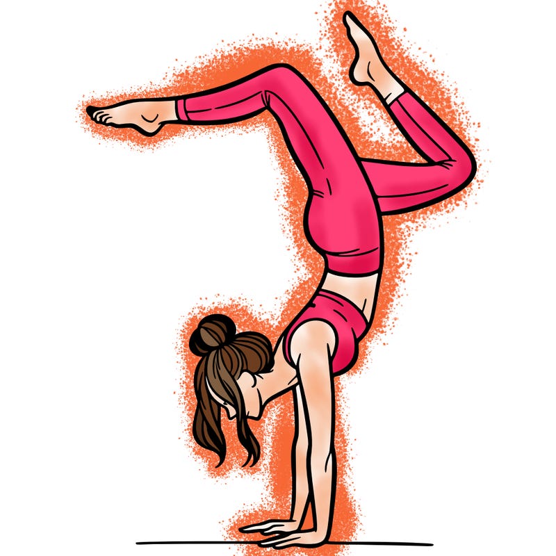 a woman doing a handstand