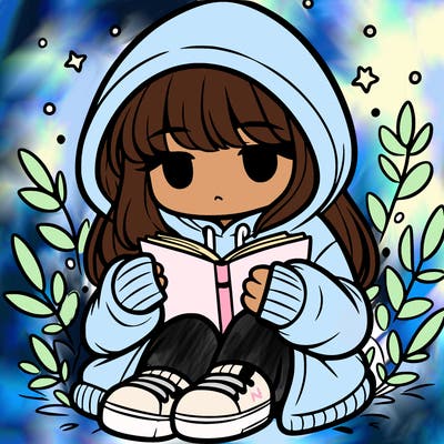girl in oversized hoodie reading a book