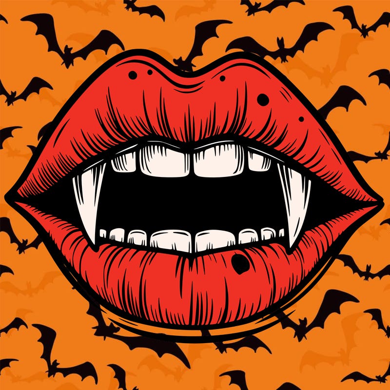 lips with vampire teeth